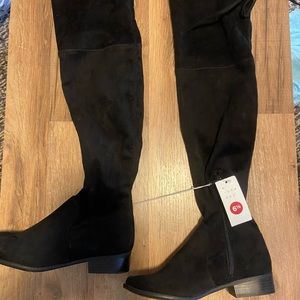 Black knee high boots with ties on top